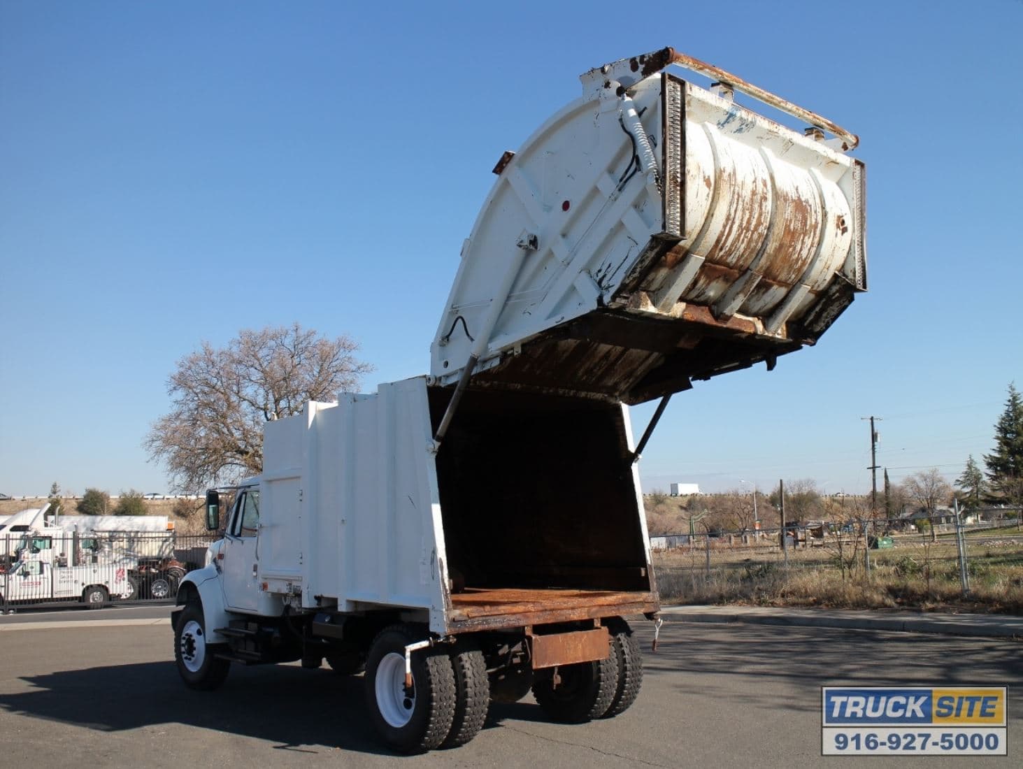 1990 International 4900 Heil 4000 16 Yard Rear Loader