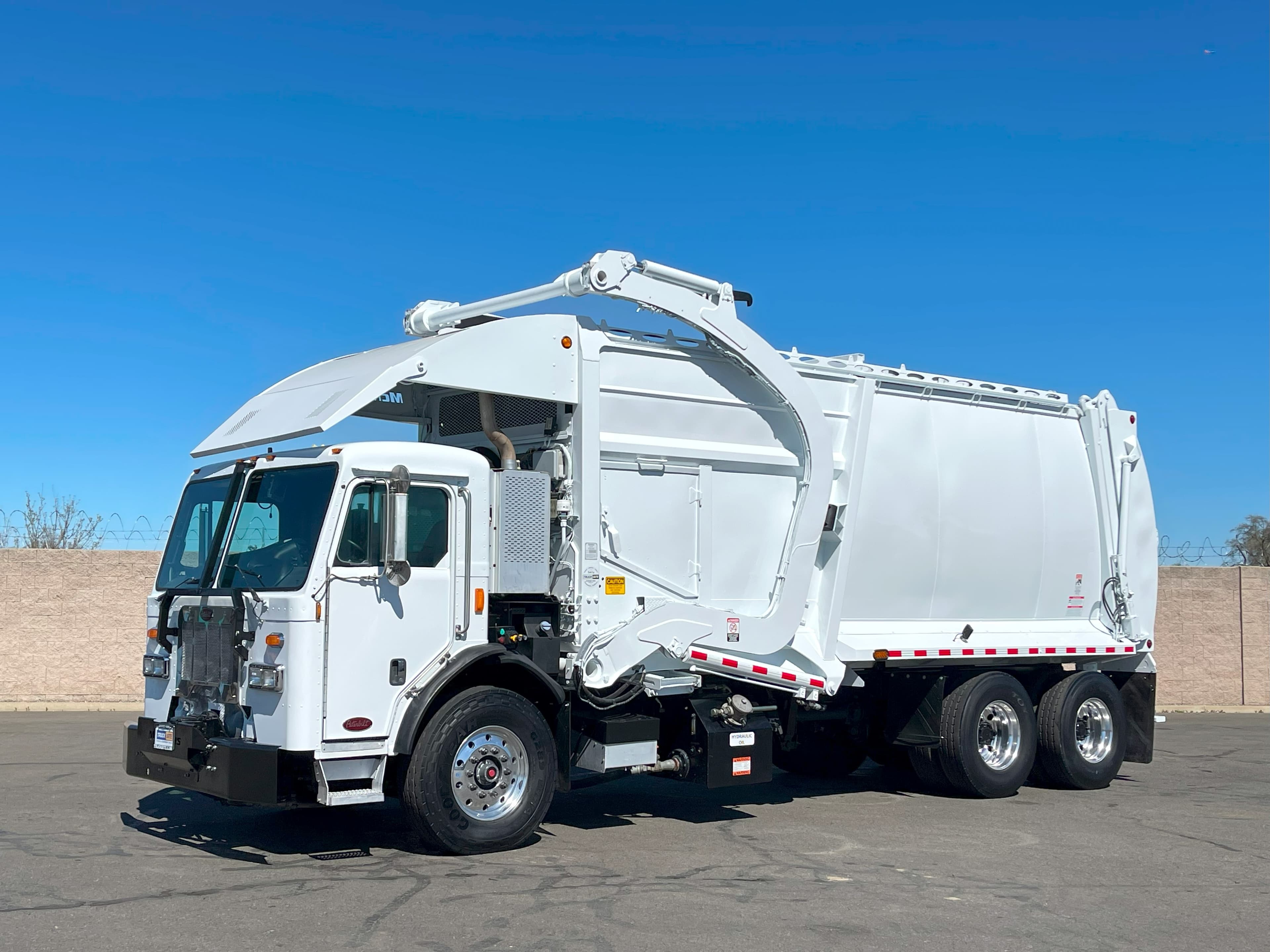 2017 Peterbilt 320 McNeilus 40 Yard Front Load Garbage Truck